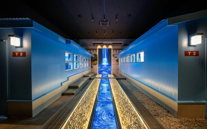 DMZ tour building interior with blue lighting and pathway, Seoul.