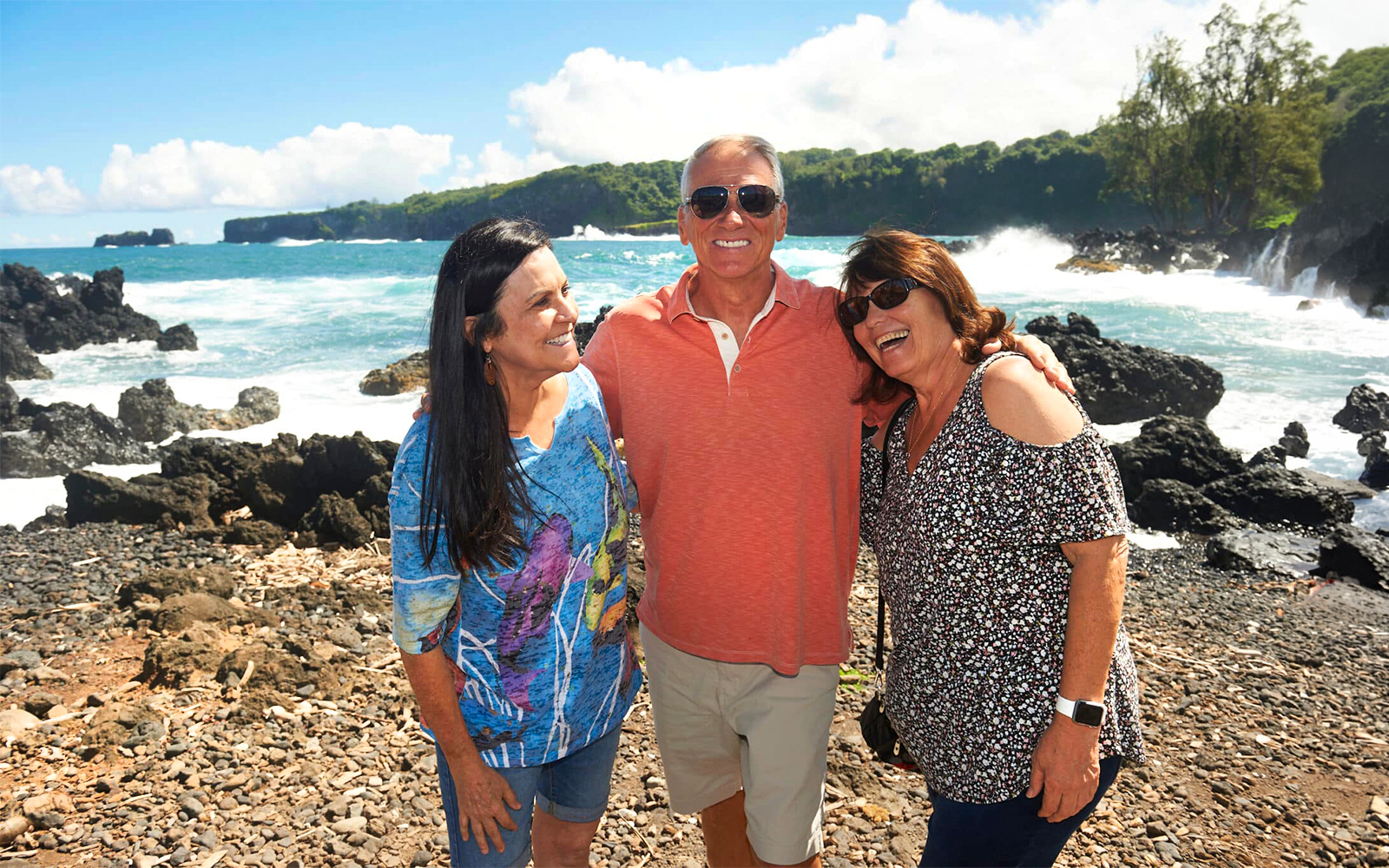 Group enjoying coastal view on Road to Hana Adventure Tour, Maui, Hawaii.