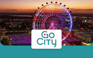Orlando Ferris wheel at sunset with Go City logo.