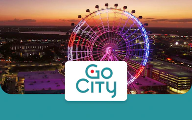 Orlando Ferris wheel at sunset with Go City logo.