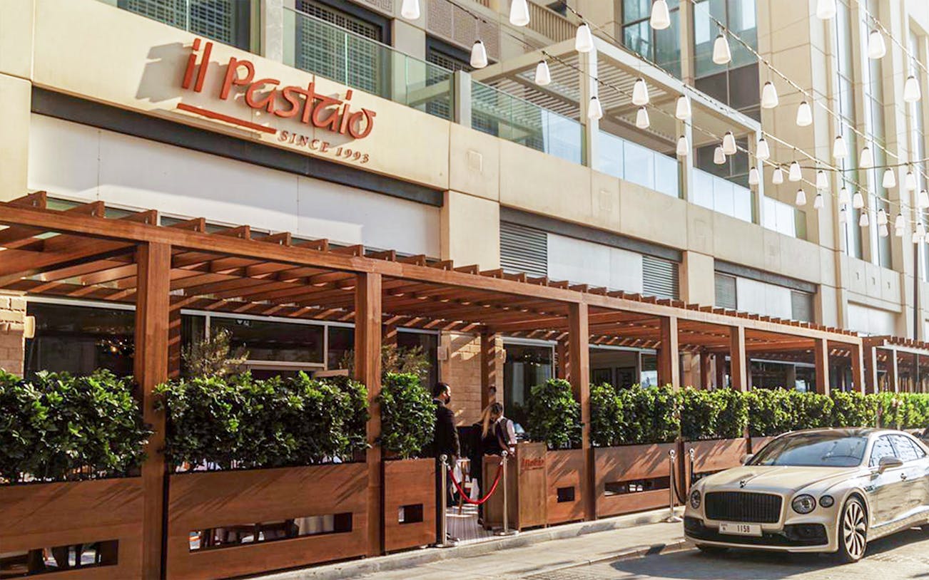 Il Pastaio Restaurant entrance with outdoor seating in Dubai.