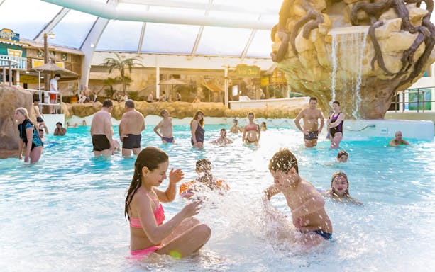 Tourists playing in the pool at Aqualibi, Walibi Belgium.