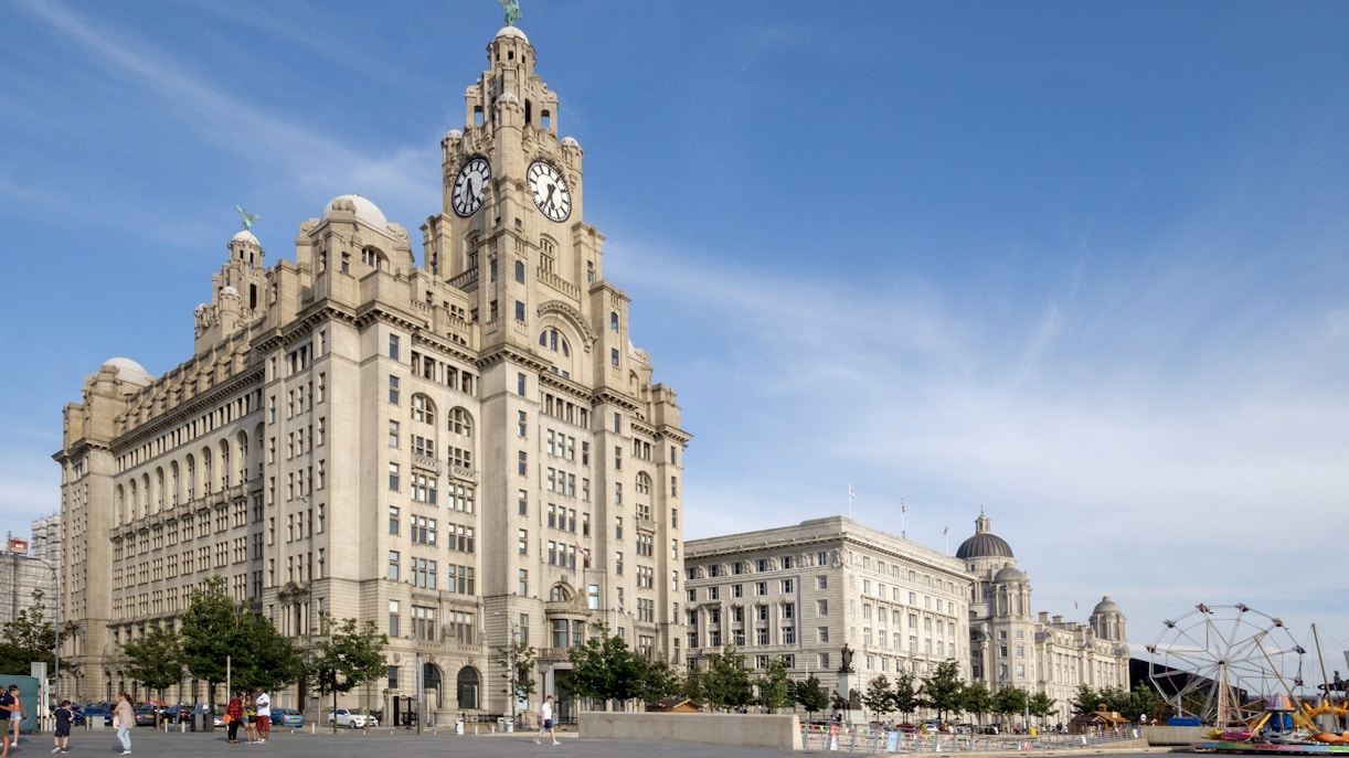 Liverpool Royal Liver Building on the Mersey waterfront with clear sky.