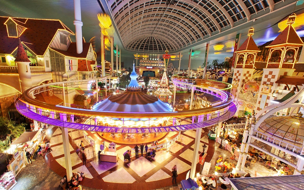 Lotte World indoor amusement park with vibrant rides and attractions in Seoul, South Korea.