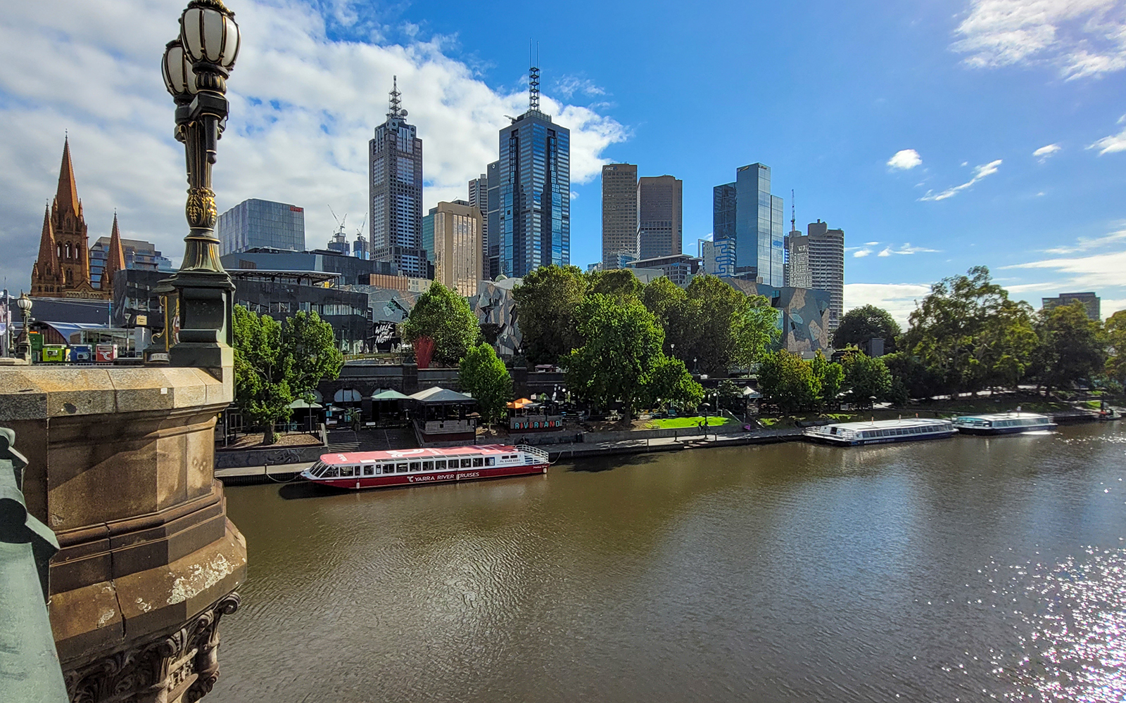 Melbourne skyline with Yarra River and St. Paul's Cathedral on Essential Melbourne Walking Tour.