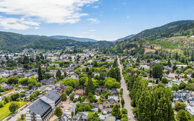 Elevated view of San Martín de los Andes with Lake Lácar in the background.