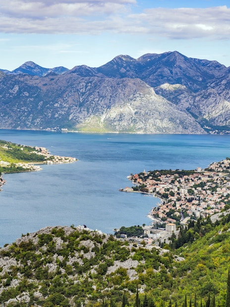 Bay of Kotor in Montenegro with coastal towns and surrounding mountains.