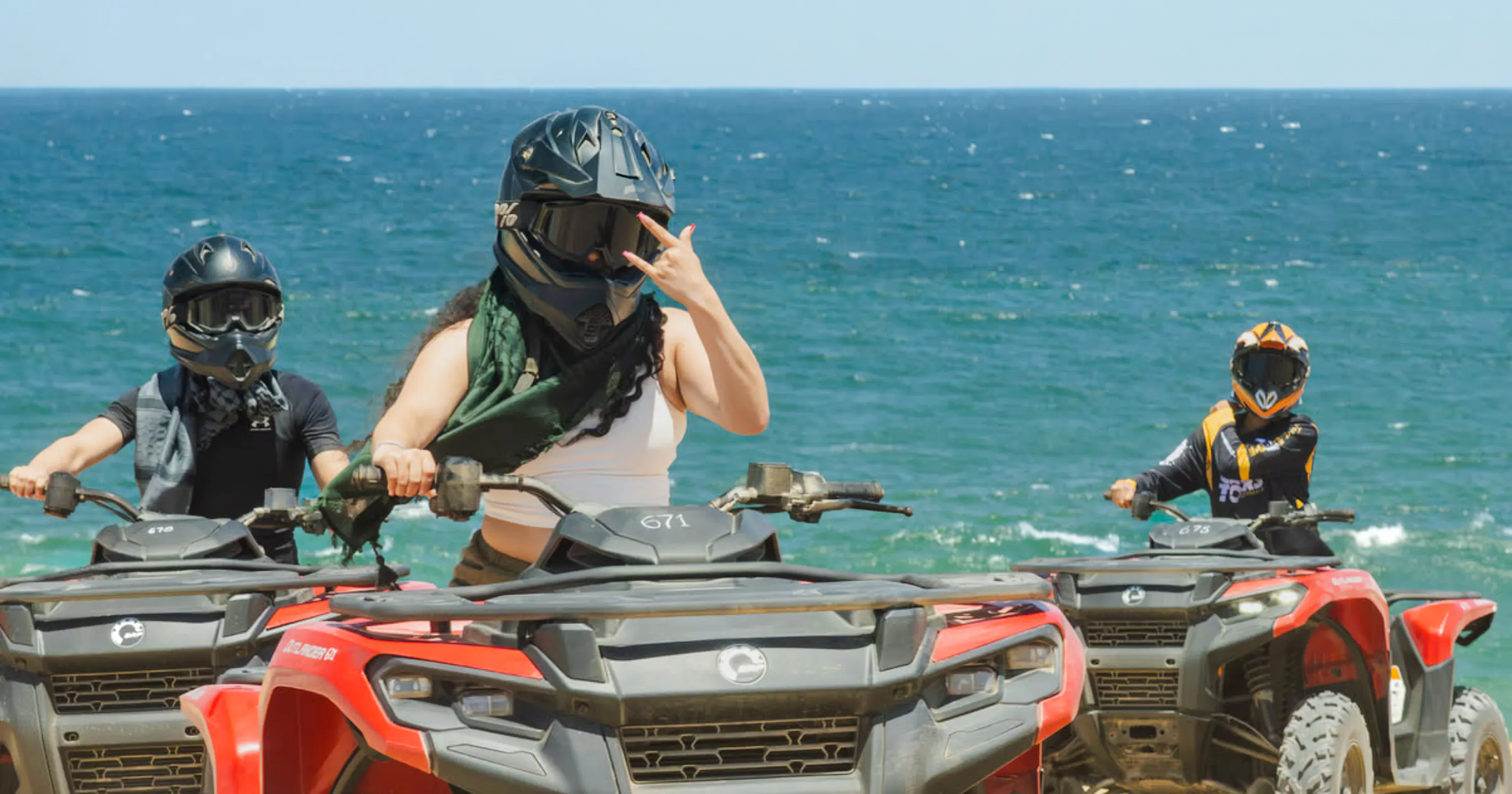 ATV riders on a beach during a multi-day Morocco road trip from Essaouira.