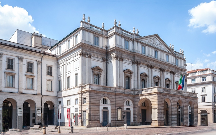 La Scala Theatre exterior in Milan, Italy, featured on a guided tour.