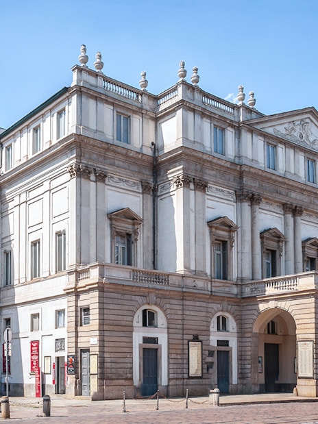 La Scala Theatre exterior in Milan, Italy, featured on a guided tour.