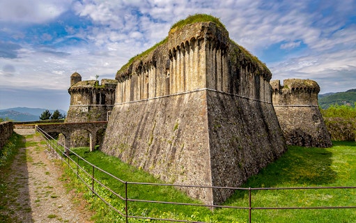 Fortezza di Sarzanello, medieval fortress with stone walls and towers, Sarzana, Italy.