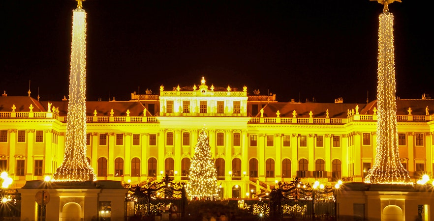 Schonbrunn Palace illuminated with Christmas lights in Vienna.