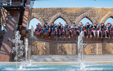 Visitors on a water ride at The Land of Legends Theme Park.