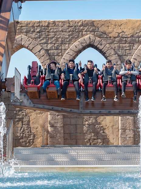 Visitors on a water ride at The Land of Legends Theme Park.