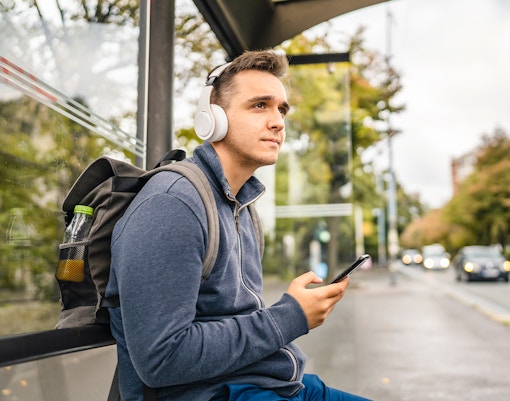 A group of people enjoying the upper deck of the HOHO Bus in New Orleans.
