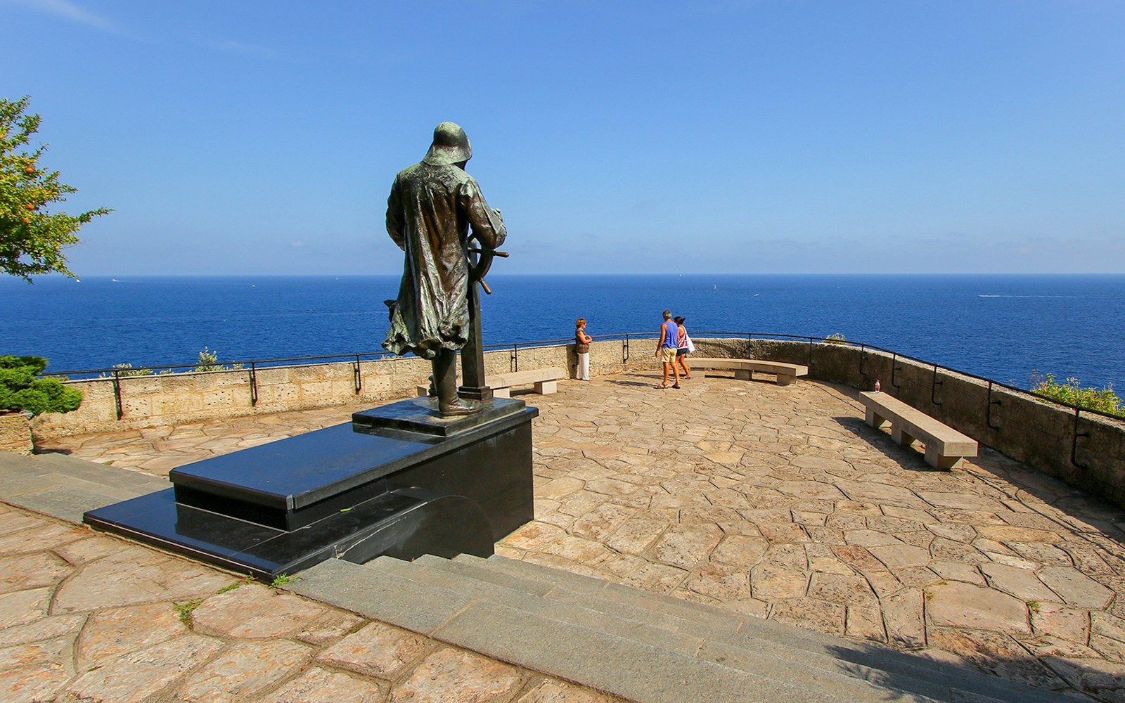 Statue overlooking the sea at St Martin Gardens, Monaco.