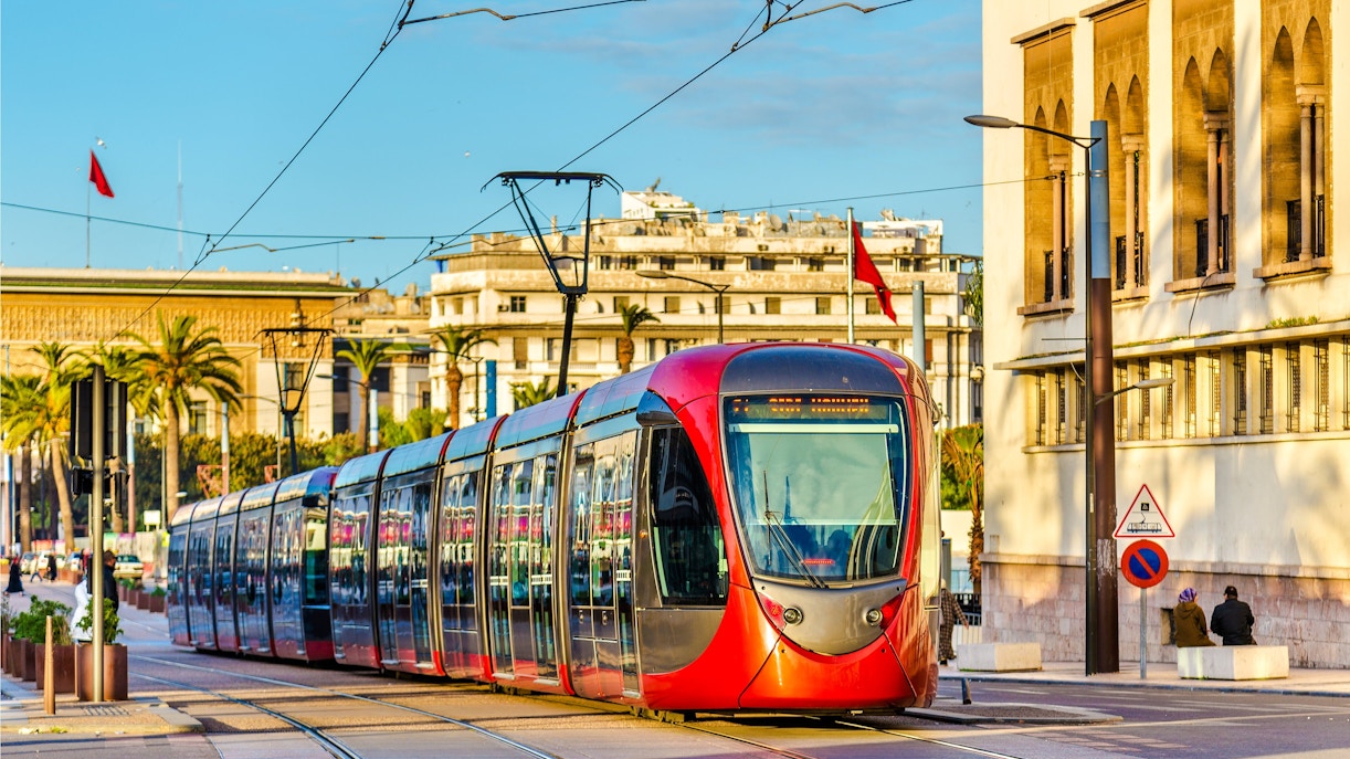 City tram traveling on a street in Casablanca, Morocco with buildings in the background.