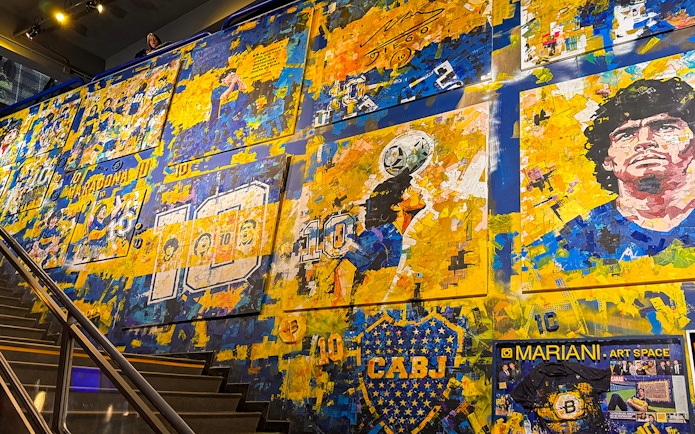 Mural of Diego Maradona inside La Bombonera stadium museum, Buenos Aires.