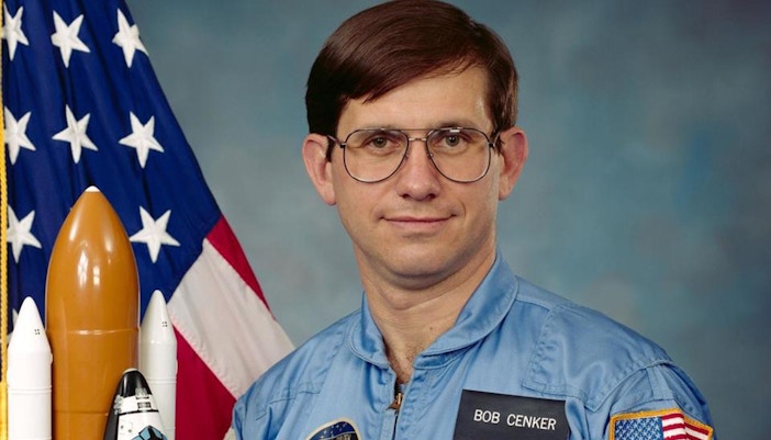 Astronaut Bob Cenker in a space suit at Kennedy Space Center.