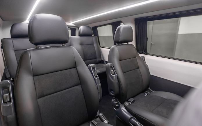 Luxury van interior for private airport transfers.