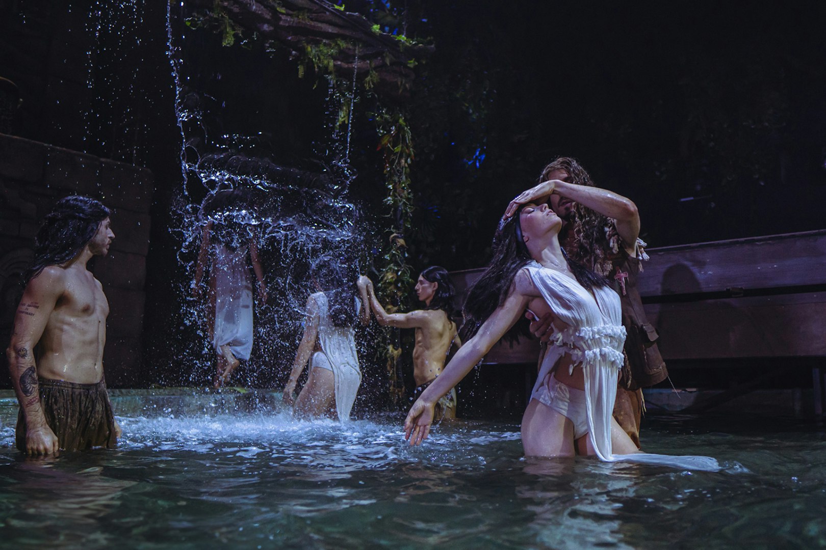 Performers in water scene from MALINCHE, un musical de Nacho Cano.