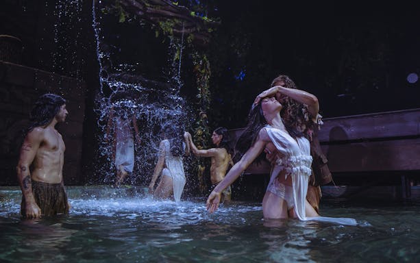 Performers in water scene from MALINCHE, un musical de Nacho Cano.
