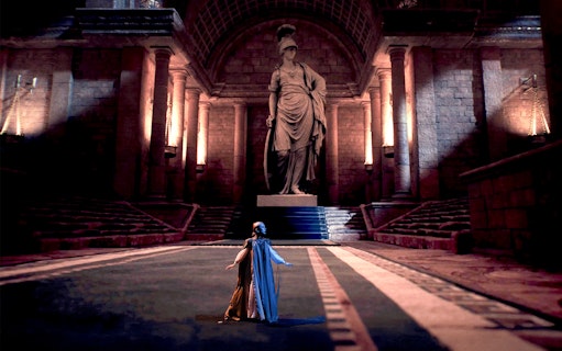 Performers in historical attire at Legends of Istanbul show in grand hall.