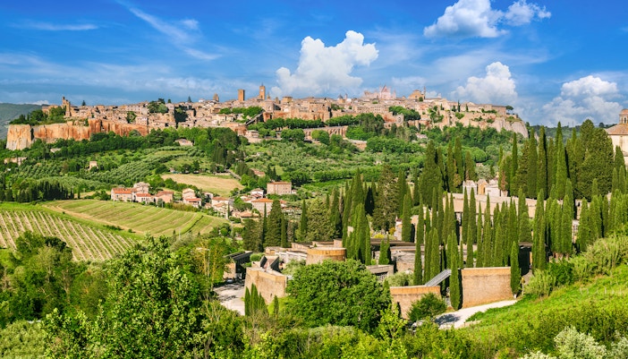 Orvieto's medieval walls and towers on a tuff hilltop in Italy.
