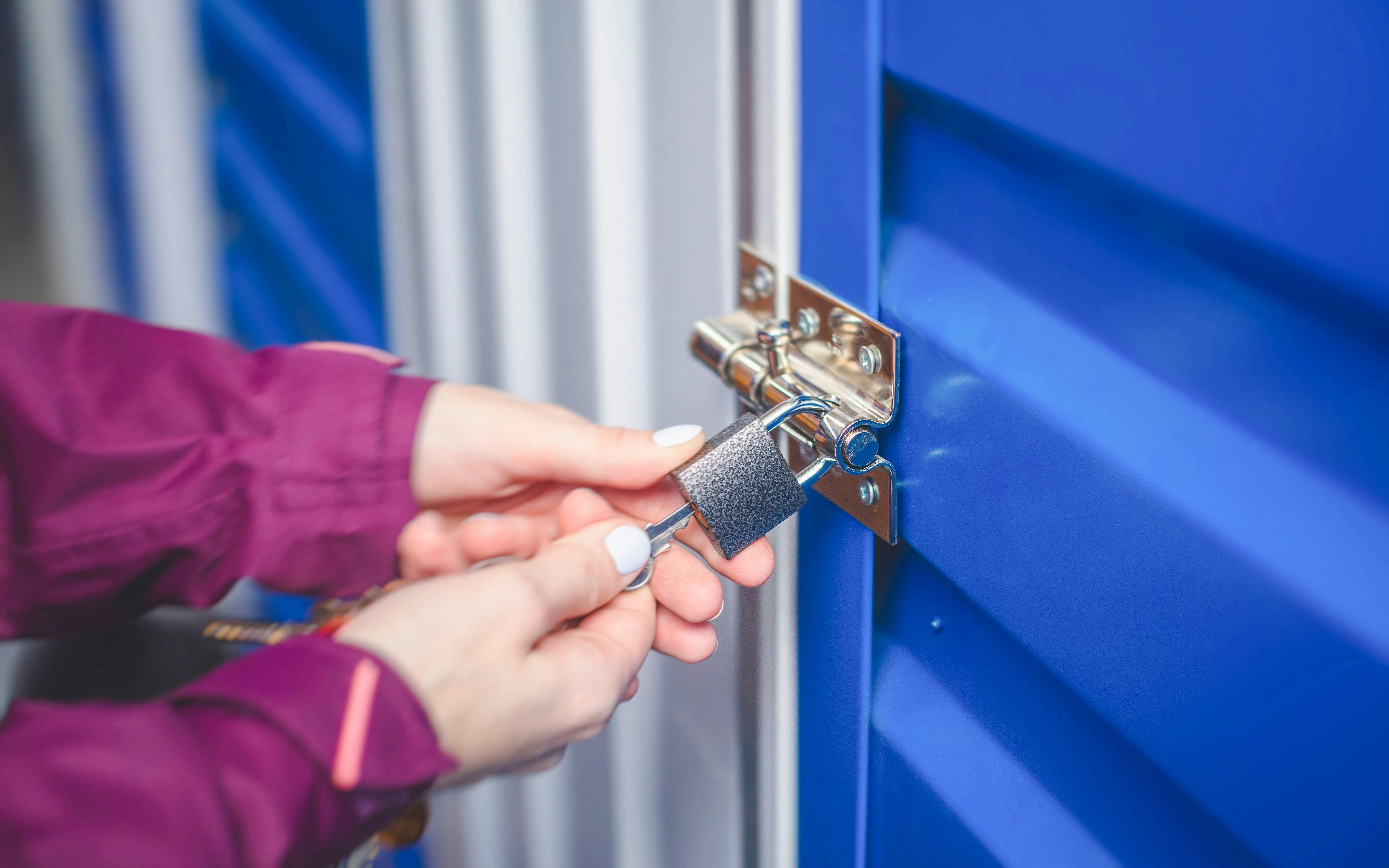 Unlocking a storage unit in Zipaquirá facility.