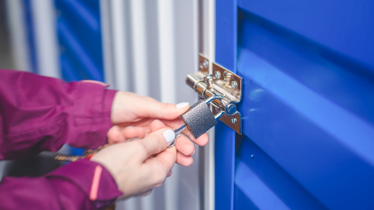 Unlocking a storage unit in Zipaquirá facility.