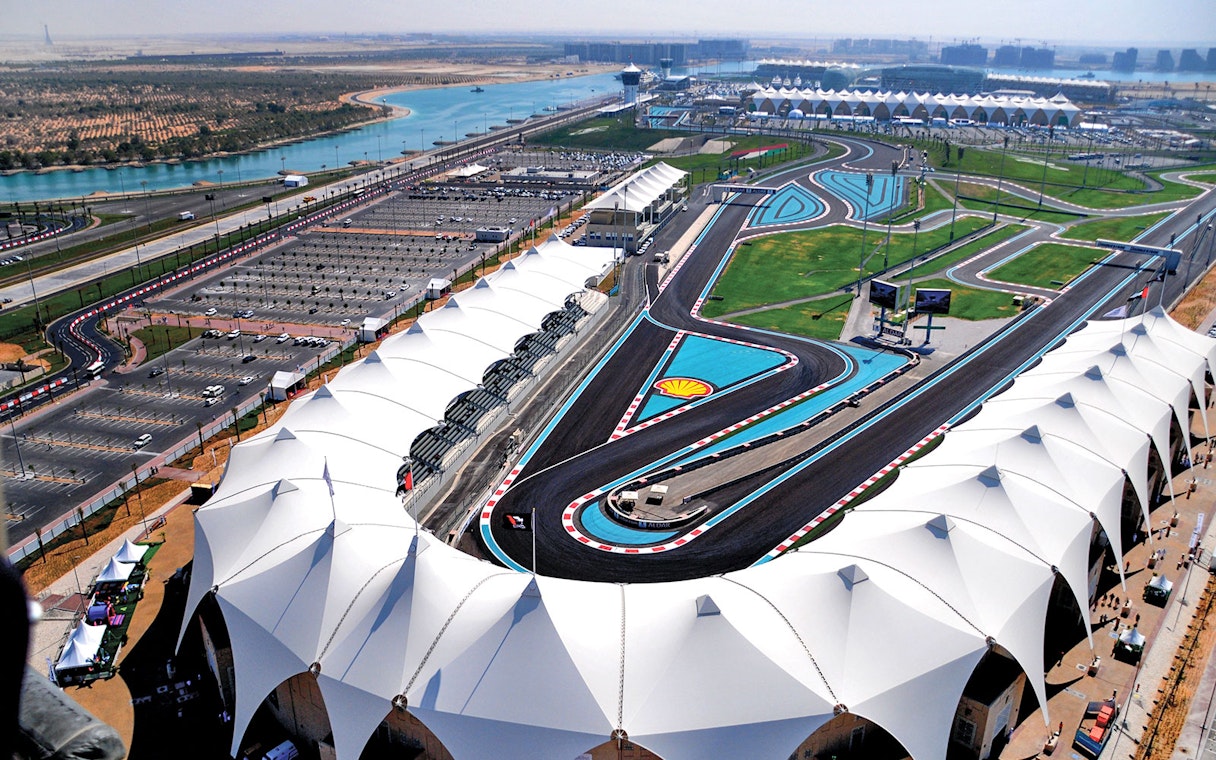 Aerial view of Yas Marina Circuit track and grandstands in Abu Dhabi.