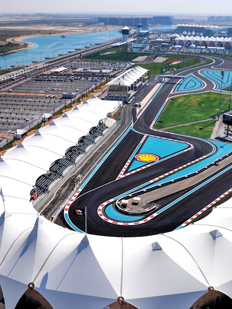 Aerial view of Yas Marina Circuit track and grandstands in Abu Dhabi.