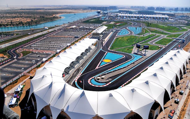 Aerial view of Yas Marina Circuit track and grandstands in Abu Dhabi.