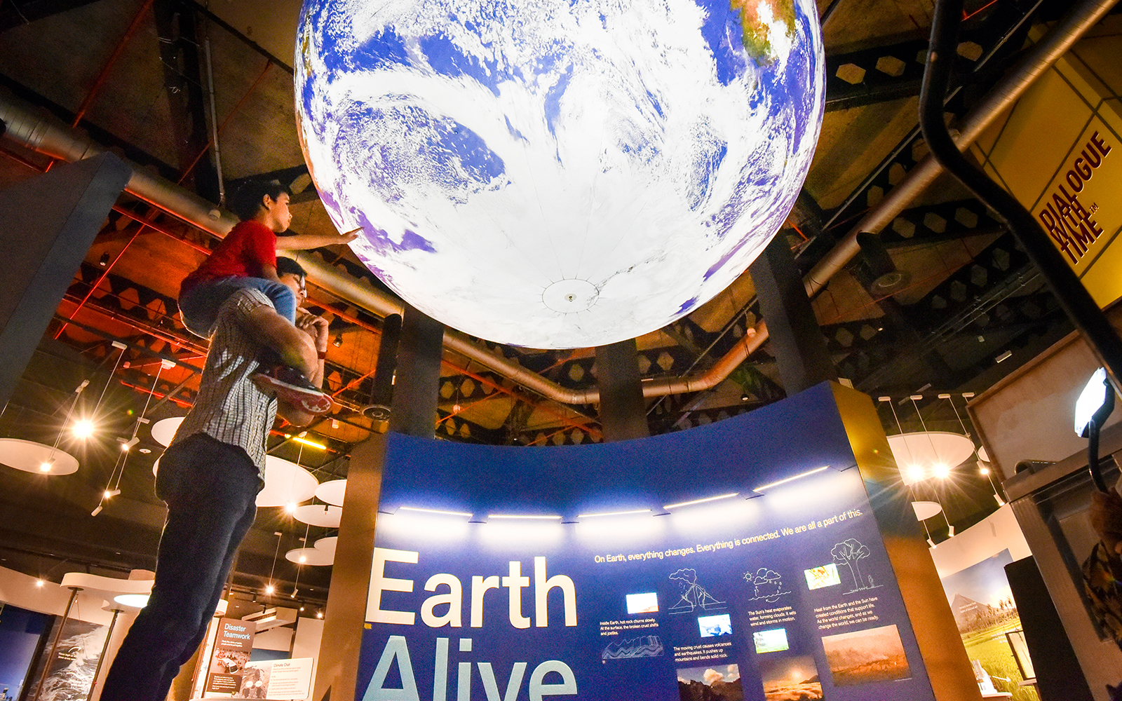Visitors exploring the interactive exhibits at the Science Centre Singapore, a popular destination for educational tours and family day trips