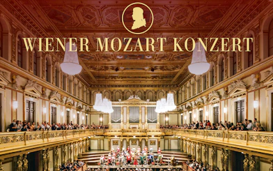 Vienna concert hall with orchestra performing Mozart concert.