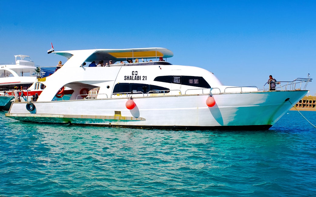 Speedboat tour in Dubai with passengers on deck.