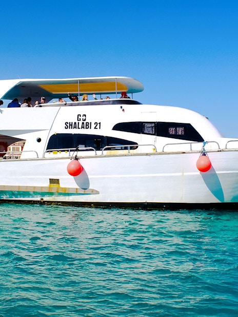 Speedboat tour in Dubai with passengers on deck.