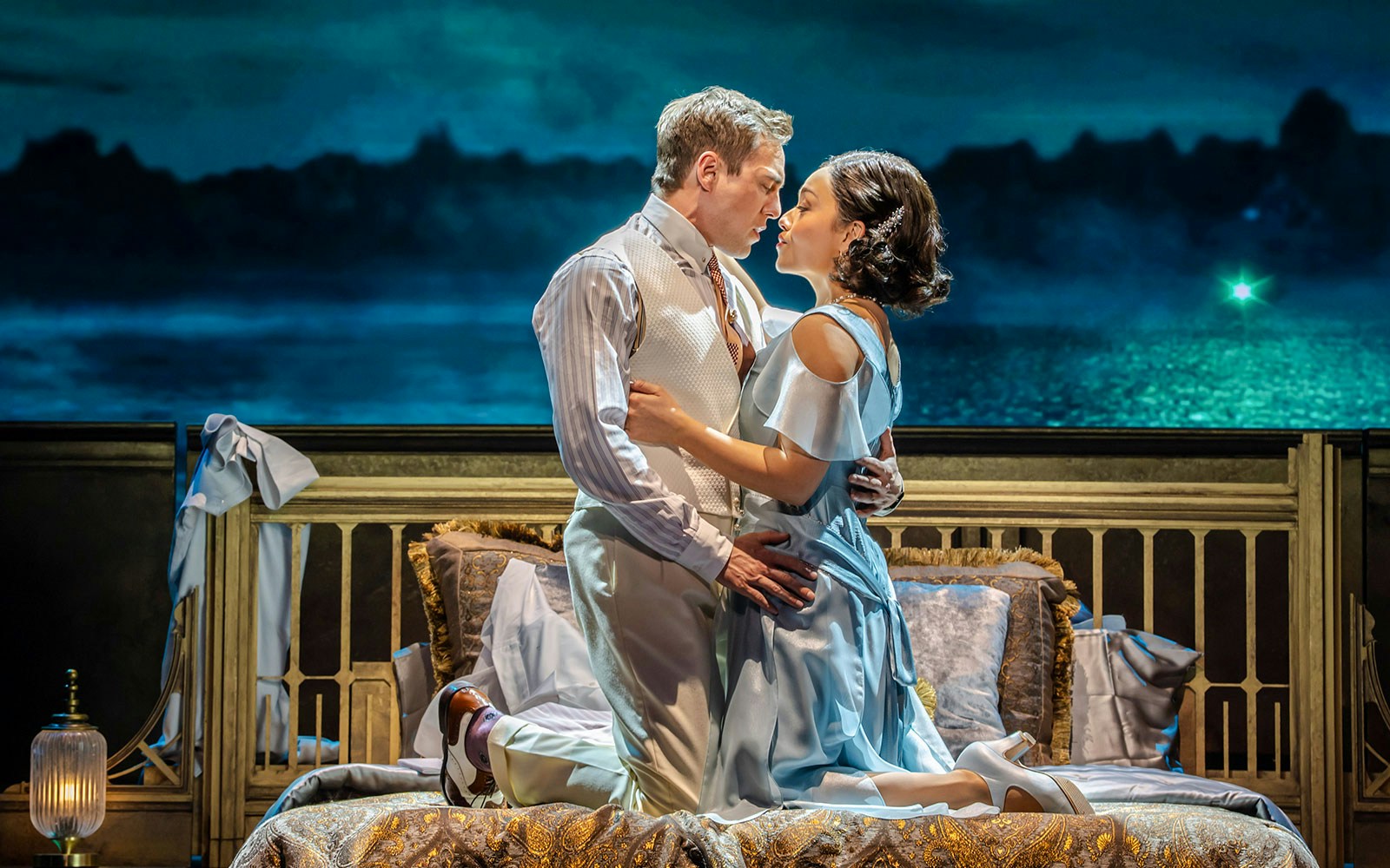 Actors in an intimate scene from The Great Gatsby Musical on stage.