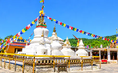 Stupas with prayer flags at Namobuddha Monastery, Bhaktapur.