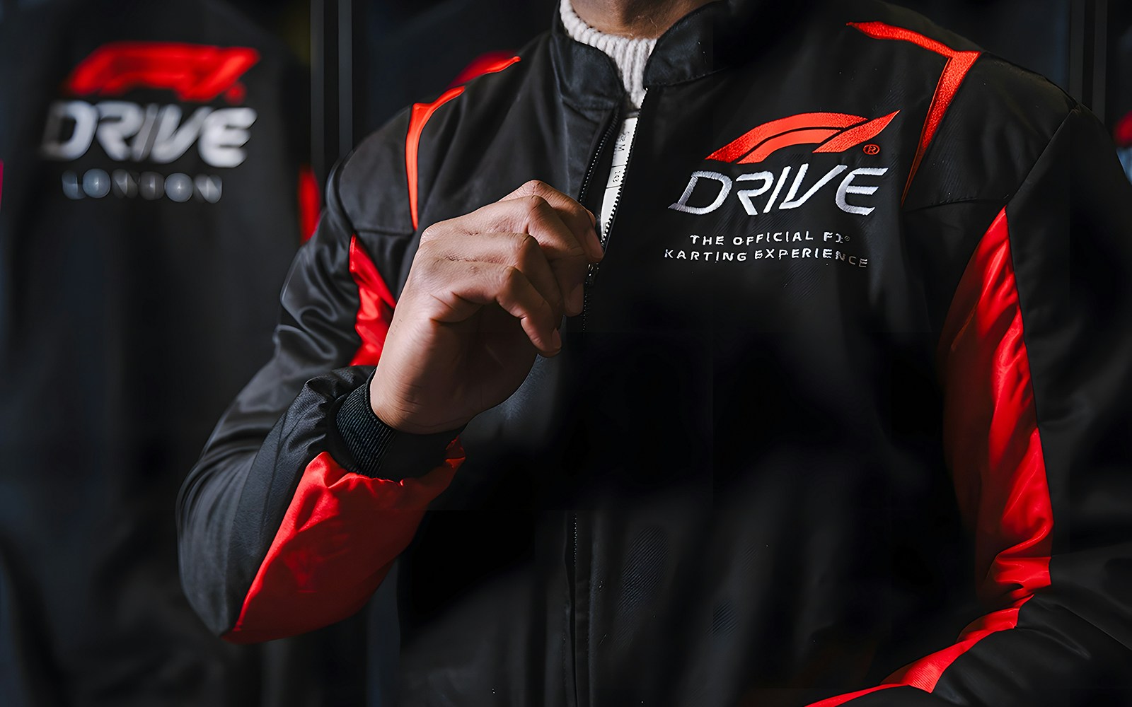 Guest wearing F1 Drive jacket at Elite session in London.