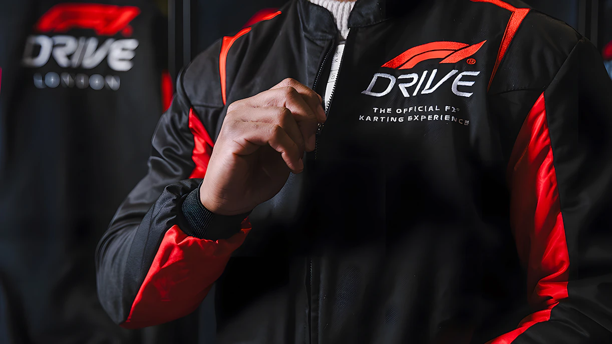 Guest wearing F1 Drive jacket at Elite session in London.