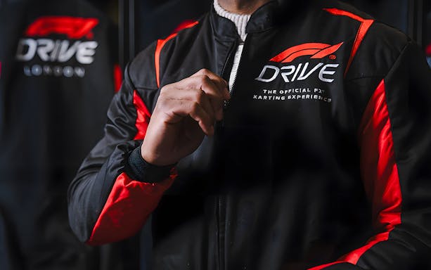 Guest wearing F1 Drive jacket at Elite session in London.