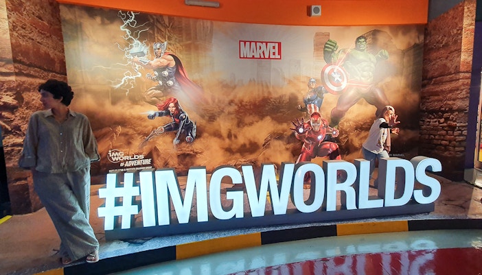 Thor Thunder Spin ride at IMG Worlds of Adventure, Dubai, with spinning seats and vibrant lights.