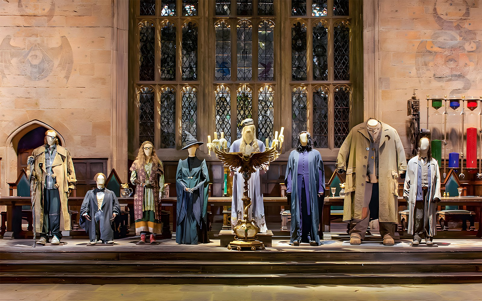 Costumes from Harry Potter characters displayed at the London tour exhibit.