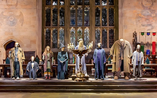 Costumes from Harry Potter characters displayed at the London tour exhibit.
