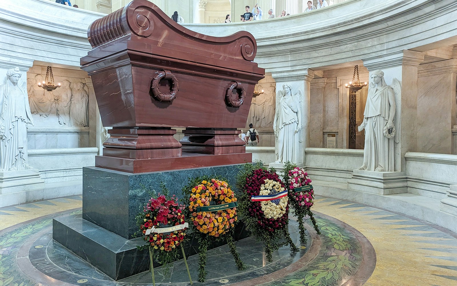 Napoleon's Tomb at Invalides, Paris Army Museum, showcasing ornate sarcophagus and historical architecture.
