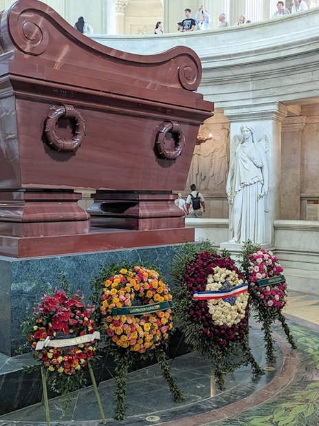 Napoleon's Tomb with floral wreaths at Invalides, Paris Army Museum.