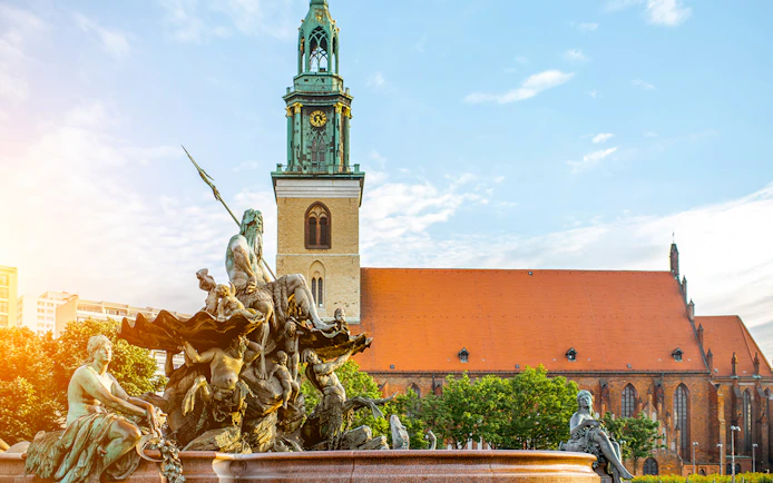 Neptune Fountain and St. Mary's Church on Berlin City Circle Hop-On Hop-Off Tour.