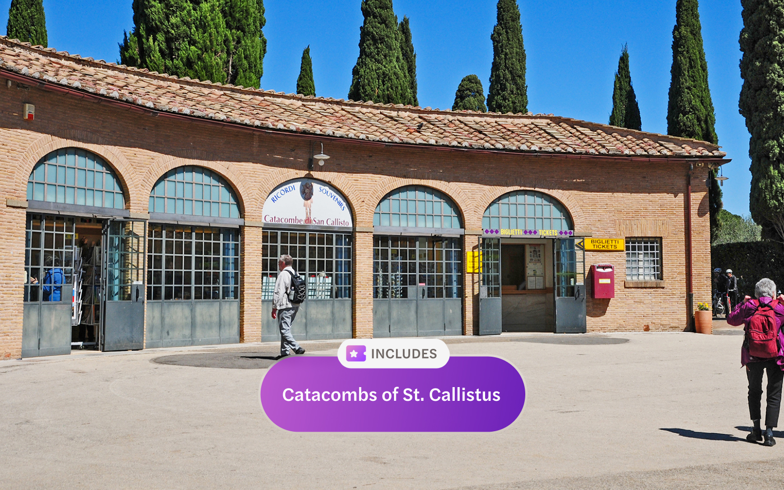 Entrance to Catacombs of San Callisto in Rome with visitors outside.