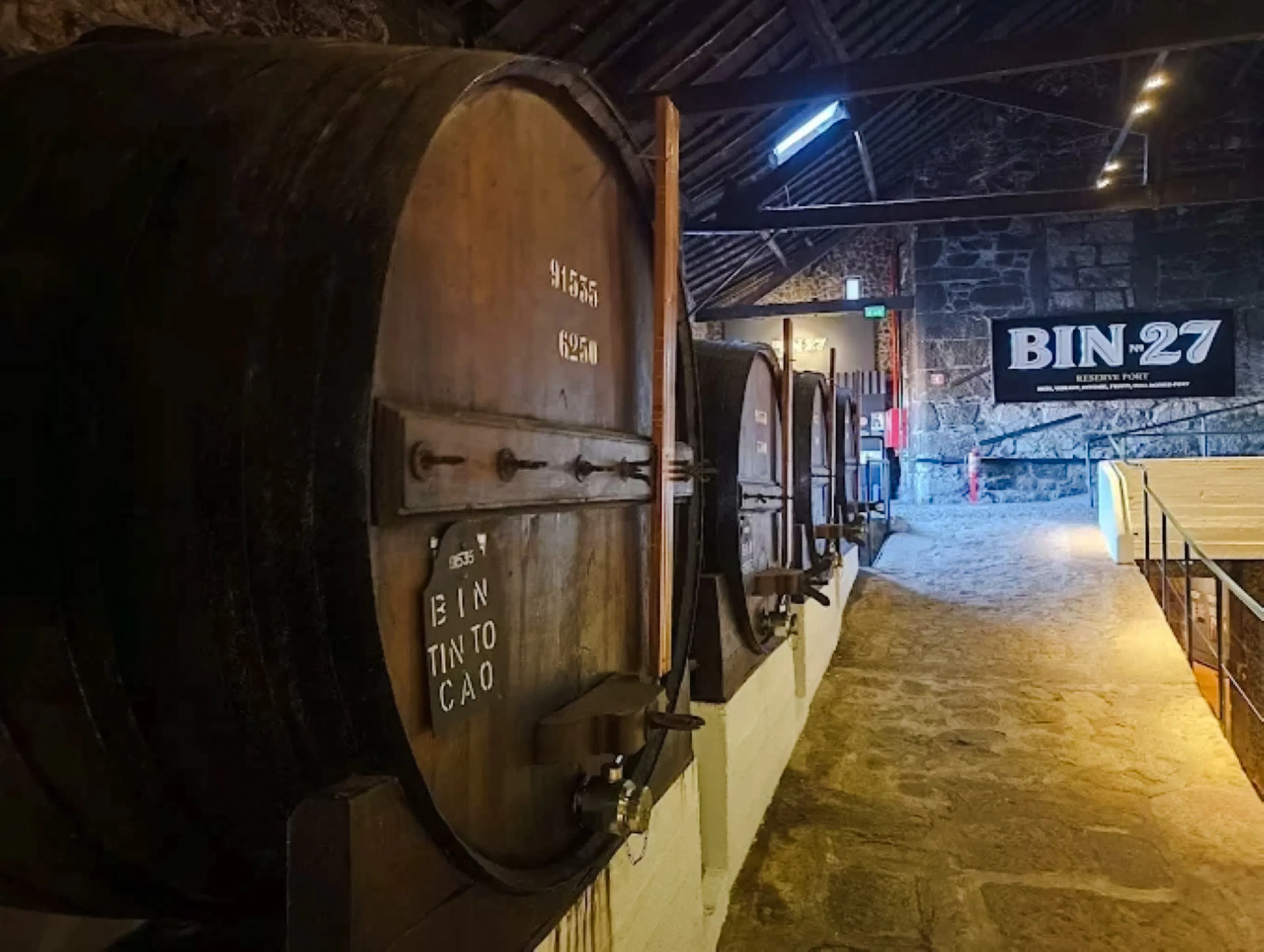 Wine barrels in a cellar at Caves do Vinho do Porto, Porto.